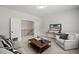 The living room is great for entertaining and relaxing, with modern furniture at 3265 Lions Ruby Ln, Atlanta, GA 30349