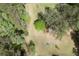 Aerial view of the property highlighting the manicured lawn and fire pit area at 5655 Mccoy Rd Nw, Acworth, GA 30101