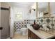 Charming bathroom with unique star-patterned tile, vessel sink, and walk-in shower at 5655 Mccoy Rd Nw, Acworth, GA 30101