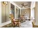 Cozy front porch featuring rocking chairs, decorative pillows, and stylish accents at 5655 Mccoy Rd Nw, Acworth, GA 30101