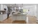 Modern kitchen with stainless steel appliances, granite countertops, and pendant lighting at 5655 Mccoy Rd Nw, Acworth, GA 30101