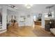 Spacious living room featuring hardwood floors and a decorative stone fireplace at 5655 Mccoy Rd Nw, Acworth, GA 30101