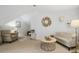 Cozy living room with ample seating, stylish decor, and a neutral color palette at 5655 Mccoy Rd Nw, Acworth, GA 30101