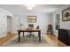 Serene home office featuring neutral colors, a desk, and a view of the outdoors at 5655 Mccoy Rd Nw, Acworth, GA 30101