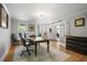 Comfortable office space with hardwood floors, a desk, and plenty of natural light at 5655 Mccoy Rd Nw, Acworth, GA 30101