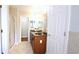 Bathroom showcasing a double vanity, tiled floor, and glass-enclosed shower at 11050 Skyway Dr, Duluth, GA 30097