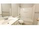 Clean and functional bathroom featuring a shower-tub combo and classic fixtures at 11050 Skyway Dr, Duluth, GA 30097