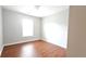Bedroom featuring wood-look floors and a bright window at 11050 Skyway Dr, Duluth, GA 30097