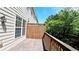 Wooden deck ideal for outdoor relaxation or entertaining, with a view of the surrounding landscape at 11050 Skyway Dr, Duluth, GA 30097