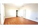 Bright living room with wood floors, french doors, and ample natural light creating a warm and inviting space at 11050 Skyway Dr, Duluth, GA 30097