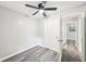 Bright bedroom with gray vinyl flooring and a ceiling fan at 2457 Shiloh Dr, Decatur, GA 30034
