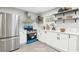 Modern kitchen featuring stainless appliances and white cabinetry at 2457 Shiloh Dr, Decatur, GA 30034