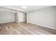 Spacious living room featuring hardwood floors and neutral paint at 2457 Shiloh Dr, Decatur, GA 30034