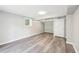 The living room features modern hardwood floors, neutral paint, and recessed lighting at 2457 Shiloh Dr, Decatur, GA 30034