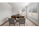 Well-lit office featuring neutral tones, a work space, and seating at 3244 Lions Ruby Ln, Atlanta, GA 30349