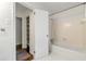 Bright bathroom with tiled shower/tub combo and white fixtures at 3300 Old Mill Ct, Decatur, GA 30033