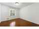 Bedroom with hardwood floors, natural light, and closet space at 3300 Old Mill Ct, Decatur, GA 30033