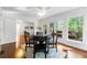 Cozy dining room with hardwood floors and natural light from the windows and french doors at 3300 Old Mill Ct, Decatur, GA 30033