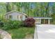 Charming single-story home with a manicured lawn and covered parking at 3300 Old Mill Ct, Decatur, GA 30033