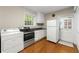 Efficient kitchen area with appliances and hardwood floors at 3300 Old Mill Ct, Decatur, GA 30033