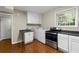 Laundry area with washer, dryer, and storage at 3300 Old Mill Ct, Decatur, GA 30033