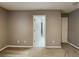 Neutral bedroom with carpeted floor and doors leading to other rooms at 4603 Parkway Circle, Atlanta, GA 30349