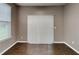 Well-lit dining area with dark wood floors and a sliding glass door at 4603 Parkway Circle, Atlanta, GA 30349