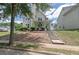 Charming two-story home with a covered front porch and landscaped front yard on a sunny day at 4603 Parkway Circle, Atlanta, GA 30349