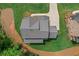 Aerial view showcasing the roof and landscaping, highlighting the property's layout at 6132 Hutchins Dr, Buford, GA 30518