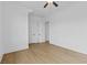 Spacious bedroom features hardwood floors, neutral paint, and ample natural light at 6132 Hutchins Dr, Buford, GA 30518