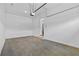 Bright garage with an entrance door, offering ample space for parking and storage at 6132 Hutchins Dr, Buford, GA 30518