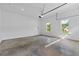 Clean, spacious garage with natural light and automatic door opener at 6132 Hutchins Dr, Buford, GA 30518