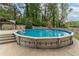 Refreshing pool with a spacious deck in a well-maintained backyard, ideal for summertime fun and relaxation at 1337 Frontier Trl, Sugar Hill, GA 30518