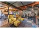 Finished basement with home office area, seating area, and bar at 1337 Frontier Trl, Sugar Hill, GA 30518