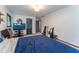 Bedroom featuring neutral colored walls and floors and musical instruments at 1337 Frontier Trl, Sugar Hill, GA 30518