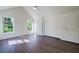 Bedroom featuring three windows, a ceiling fan and closet at 2867 Payton Ne Rd, Atlanta, GA 30345