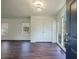Bright entryway boasts hardwood floors, white walls, a coat closet, and a window seat at 2867 Payton Ne Rd, Atlanta, GA 30345