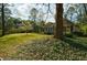 Beautiful home with lush green lawn and landscaping creating a serene and inviting atmosphere at 2867 Payton Ne Rd, Atlanta, GA 30345