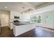 Modern kitchen featuring an island with dark countertops, white cabinets, and stainless steel appliances at 2867 Payton Ne Rd, Atlanta, GA 30345