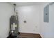 Utility room featuring a newer model hot water heater at 2867 Payton Ne Rd, Atlanta, GA 30345