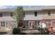 Charming backyard view showcasing the deck, brick facade, and well-maintained landscaping at 545 Woodland Park Ter, Lawrenceville, GA 30043