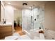 Bathroom featuring a walk-in shower, soaking tub, and marble countertops at 902 Lenox Hill Ne Ct, Atlanta, GA 30324