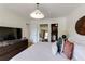 Modern bedroom with a view of the living room and closet with wood flooring at 902 Lenox Hill Ne Ct, Atlanta, GA 30324