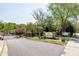 The gated entrance to a lush community and signage for Lenox Hill and 2715 Lenox Road at 902 Lenox Hill Ne Ct, Atlanta, GA 30324
