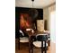 Modern dining room features stylish lighting and dark walls for a sophisticated aesthetic at 902 Lenox Hill Ne Ct, Atlanta, GA 30324