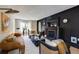Comfortable living room with a fireplace, neutral colors, and plenty of seating options at 902 Lenox Hill Ne Ct, Atlanta, GA 30324