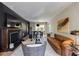 Elegant living room with fireplace, stylish furnishings, and ample natural light at 902 Lenox Hill Ne Ct, Atlanta, GA 30324
