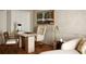 Home office featuring a desk, chairs, and a comfortable chaise lounge at 902 Lenox Hill Ne Ct, Atlanta, GA 30324