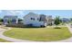 View of the home's backyard featuring a lush lawn and a privacy fence at 113 Cottage Walk, Cartersville, GA 30121