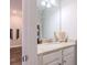 Modern bathroom featuring a granite countertop, white cabinetry, and stylish fixtures at 113 Cottage Walk, Cartersville, GA 30121